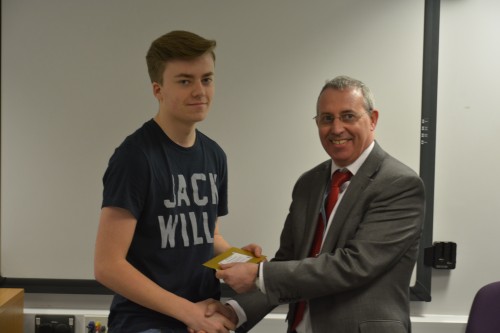 Charlie Dixon accepts his award