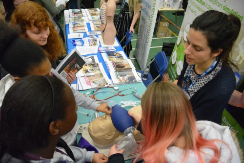 Students talk to NHS representative