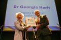 Dr Georgia Herlt award the College